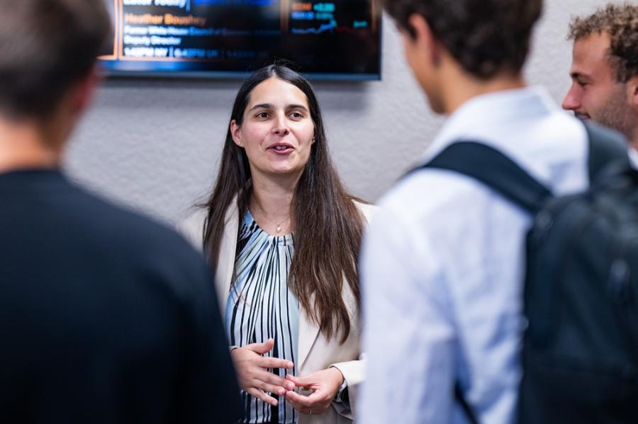 Students speaking with an alumna at the College of Business