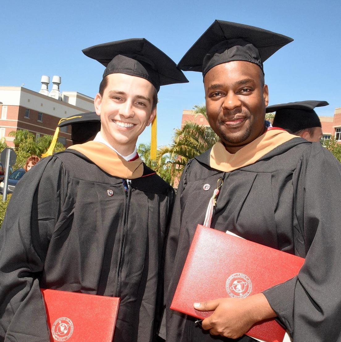 Two students after commencement