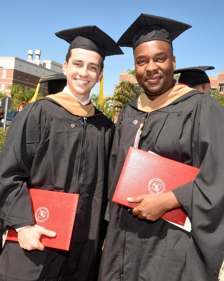 Two students after commencement