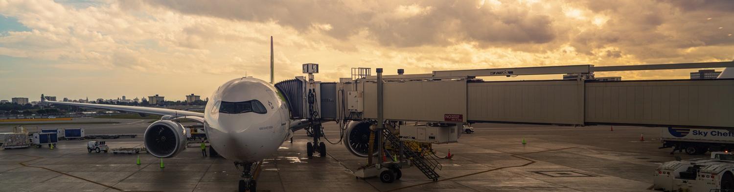 An airplane at a gate Miami Florida