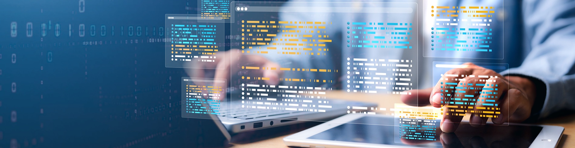 Conceptual visualization of computer code over a laptop as an individual types
