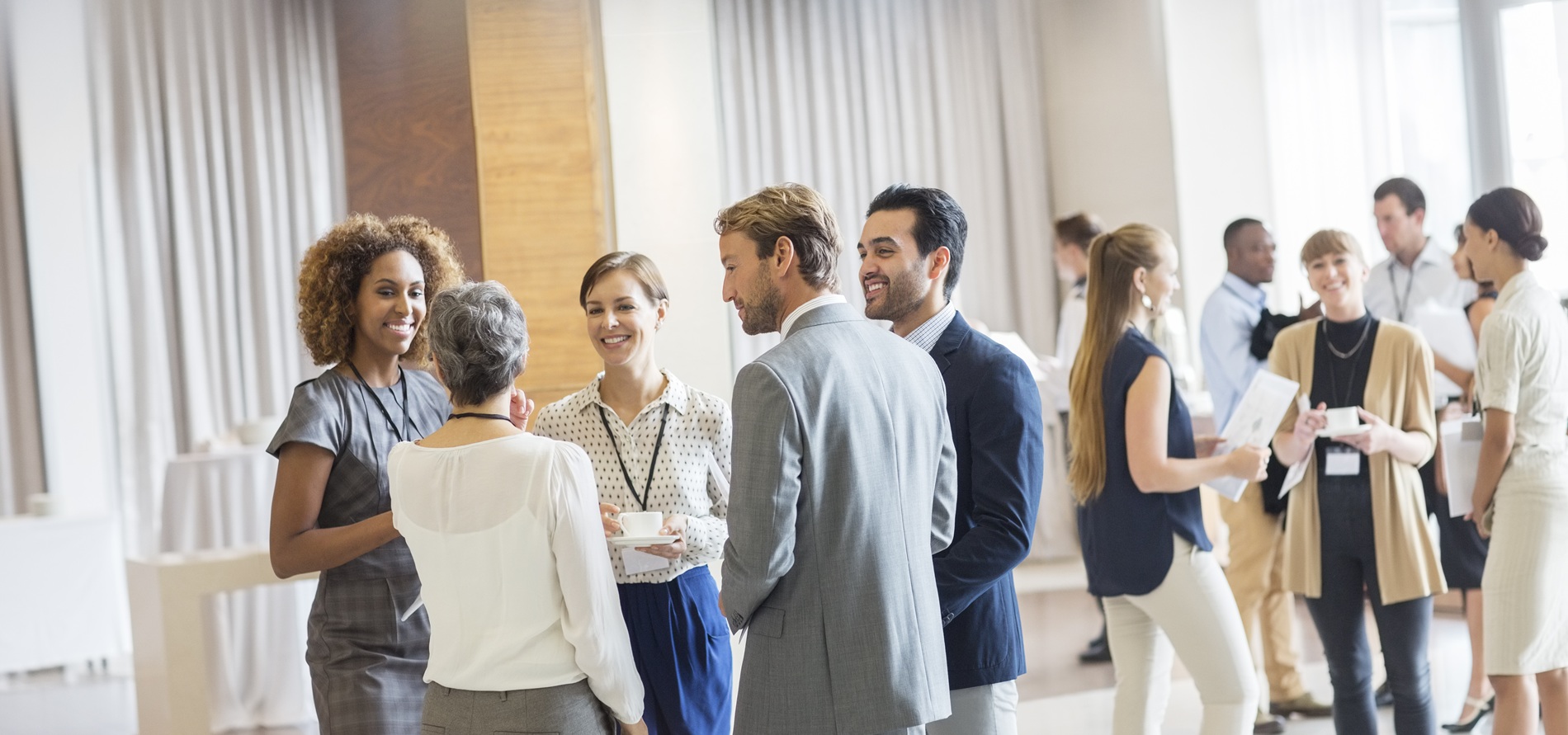 Groups of workers talking together