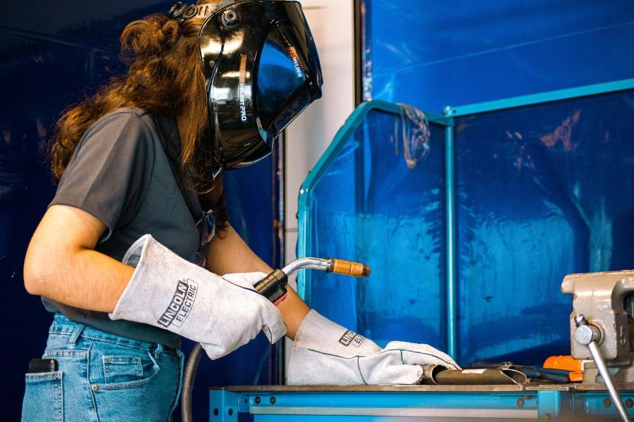 A student working on an automotive project