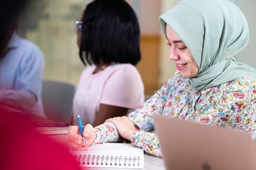 A student takes notes