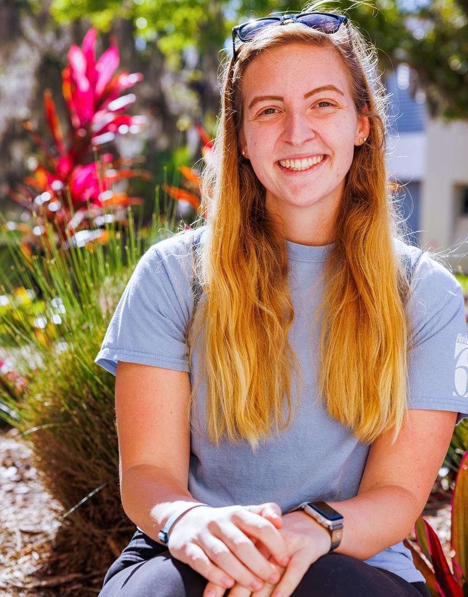 A student enjoying the sunshine on campus.