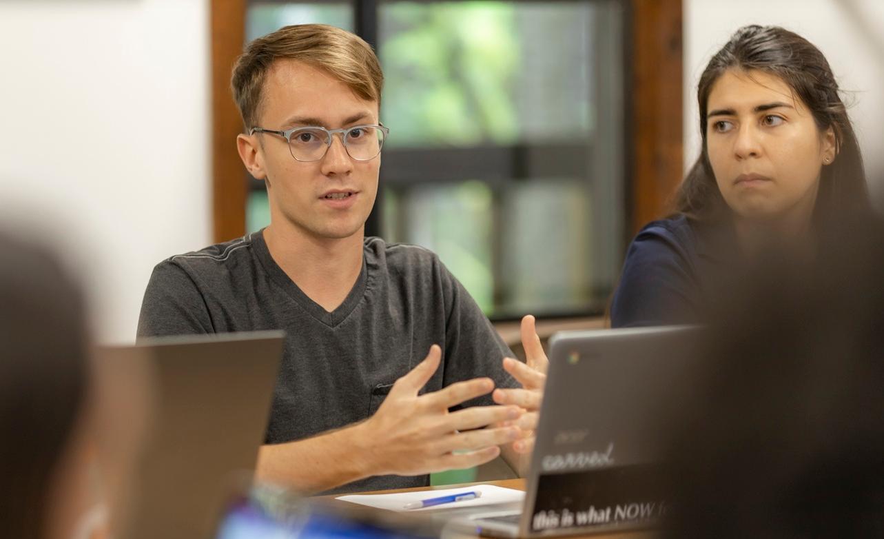 A student engaging in a class discussion