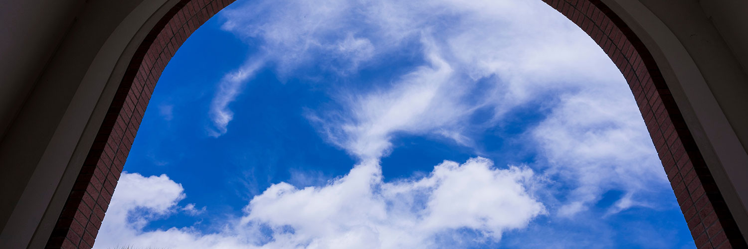 Sky View Through an Archway on Campus