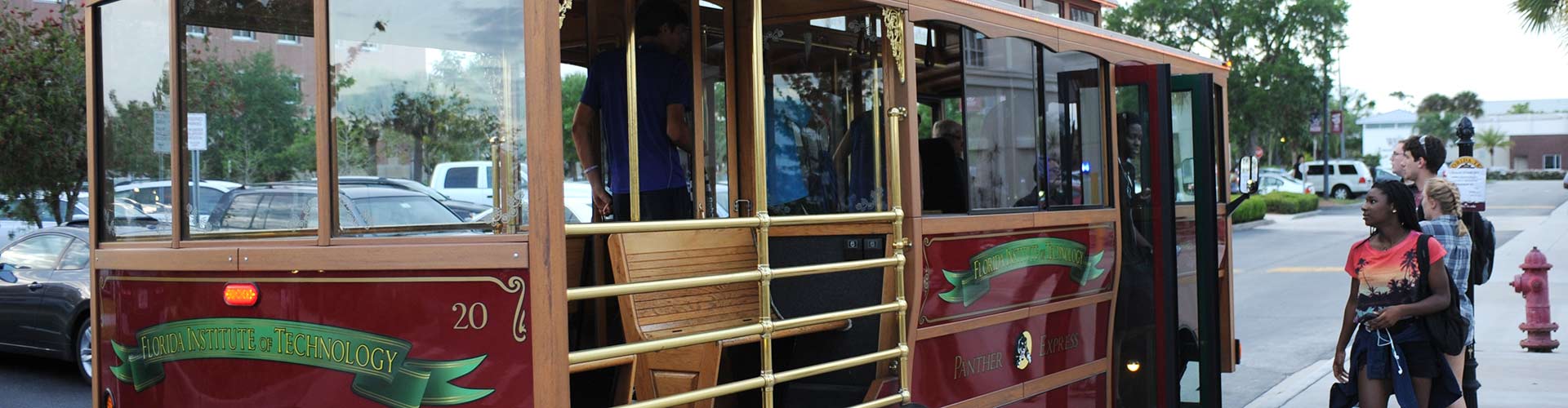 Trolley picking up students