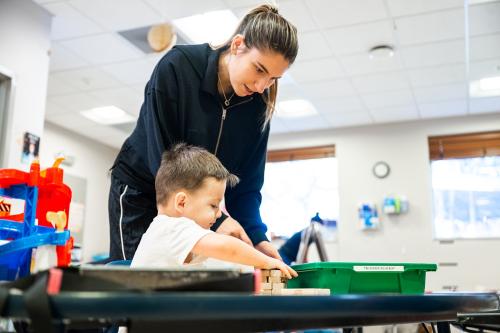 An ABA practitioner working with a child