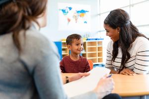 Registered behavior technicians working with a child