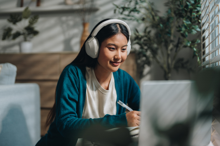 Student Studying Online with Headphones