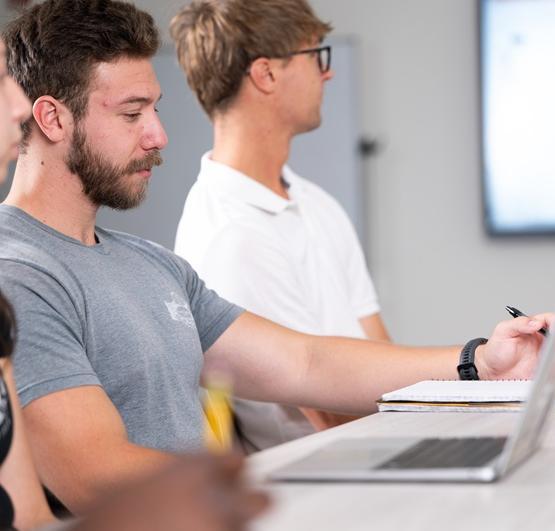 Students having a meeting in a research lab