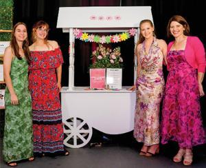 Guests at An Evening of Hope wrote heartfelt messages to be displayed. Pictured, far right, is Kimberly Sloman, director of The Scott Center.