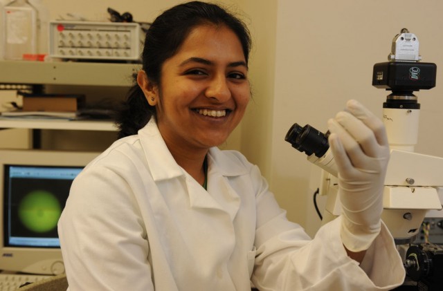 Student with a microscope