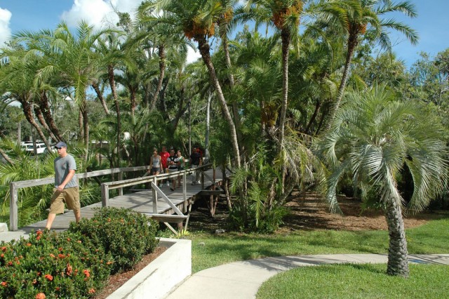 Students walking over a bridge at Florida Tech