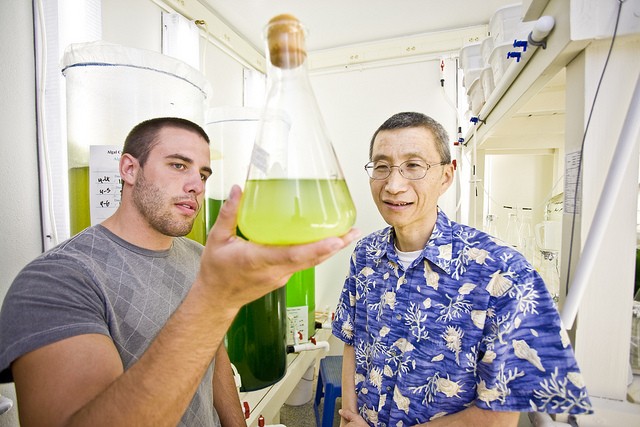 Student and teacher in chemistry lab