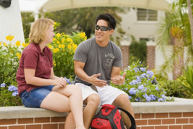 Two students talking outside