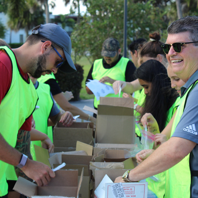 Students Helping with Food Packaging