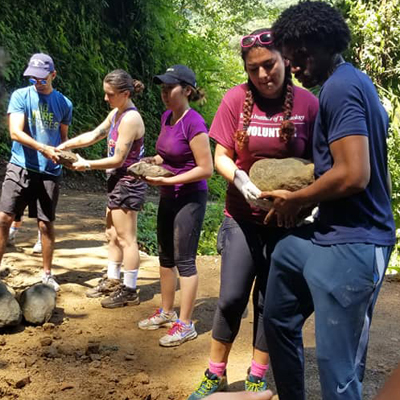 Students Moving Rocks