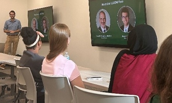 Students at a premed club meeting