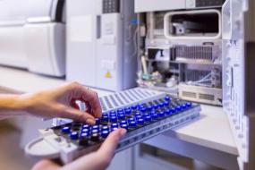 The laboratory scientist prepares samples for download to High-performance Liquid Chromatograph Mass Spectrometr.