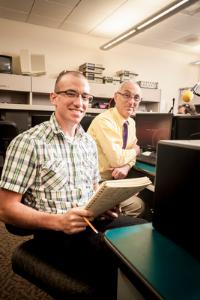 Dr Kepuska and grad student Sean Powers working on research