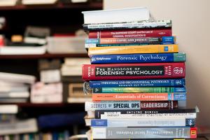 a stack of psychology books