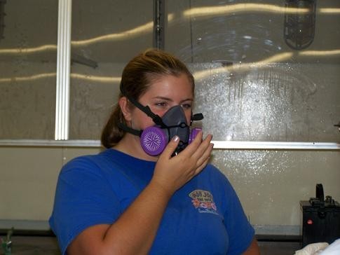 Student testing out a face mask