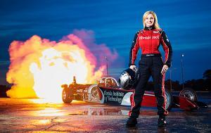 Elaine Larsen in front of jet car