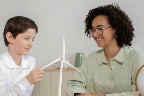 applied behavior analyst working with a child