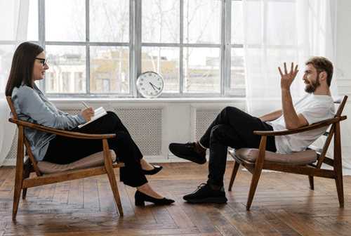 psychologist with client
